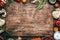 Food cooking background, ingredients for preparation vegan dishes, vegetables, roots, spices, mushrooms and herbs. Old cutting