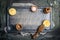 Food or cooking background with salt ,pepper and lemon on gray vintage gutting board