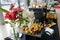 Food court. A set of catering dishes, food on a black plate.