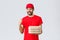 Food delivery, quarantine, stay home and order online concept. Enthusiastic courier in red t-shirt and cap, bring pizza
