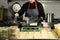 food delivery in the restaurant. hands of a woman chef in uniform with gloves weighing a portion of rice on an