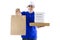 Food delivery service or order food online. Delivery man in blue uniform hand holding food packaging container and paper bag