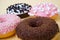 Food. Dessert. Dessert colorful snack. Delicious donut with sprinkles. Bakery cake. Sweet food dessert donuts. Close-up of donuts