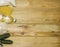 Food donations on a wooden background on the side, top view with copy space. Butter, cereals, canned food. The products of the fir