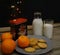 food and drink mandarins cookie biscuit milk glass bottle table still_life