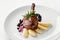 Food. Duck leg with pear and currant sauce. Delicatessen Gourmet Restaurant Menu Concept