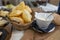 Food of Emilia Romagna region, deep fried bread gnocco fritto or crescentina served in restaurant in Parma, Italy