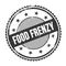 FOOD FRENZY text written on black grungy round stamp