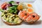 Food, fried eggs with toast and mousse and salmon and avocados on a plate