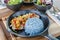 Food healthy, garlic pork with blue rice, blue color made from b