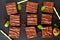 Food homemade Bakery concept Top view of Organic Brownies on black slate board
