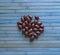 Food image close up candy, chocolate milk, extra dark almond nuts. Texture on top view background