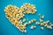 Food. Image of the Heart Forms from Popcorn. Delicious Popcorn o