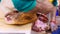 Food industry, butcher cutting pork leg jamon serrano.