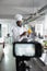 Food industry worker with yellow bell pepper recording culinary course in restaurant professional kitchen.