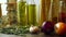 Food ingredients on kitchen table. Closeup of onion, garlic and rosemary herb