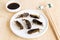 Food Insects: Crickets insect fried crispy for eating as food items is good source of meal high protein edible in plate with