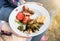 Food leftovers on the plate. Vegetables, meat and bread