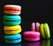 Food. macaroons black background