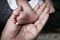 food newborn in hand of mother,vintage