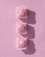 Food : Overhead of pink iced sponge cakes on a pink background. 7