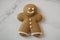 Food photography of a miniature gingerbread man