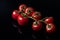 Food photography Nice fresh delicious cherry tomato in a black board