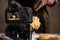 Food photography. Shooting of woman making pasta, camera