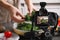 Food photography. Shooting of woman making salad, focus on camera
