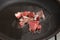 Food preparation - meat pieces in frying pan