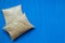 Food products rice and oatmeal lie on blue background. Useful complex carbohydrates, proper nutrition. Crisis food supply for the