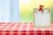 Food recipe template. Empty wooden frame on a table with a red w