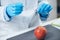 Food Safety Laboratory Analysis - Biochemist looking for presence of pesticides in apples