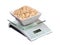 Food scale with oatmeal bowl electronic and digital isolated