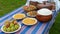 Food table, food in ceramic pans, salad, fruit