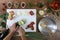 Food top view, hands cutting eggplant on white chopping board