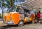 Food truck in a classic orange volkswagen van