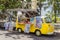 Food truck in a classic yellow volkswagen van at the Garuda Wisnu Kencana Cultural Park