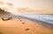 Foodsteps and sunset on the beach by Tayrona in Colombia