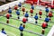 Foosball table soccer. Sport team football players. Mini football table. Tabletop soccer table