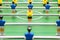 Foosball table soccer. Sport teame football players. Mini football table. Tabletop soccer table