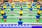 Foosball table soccer. Sport teame football players. Mini football table. Tabletop soccer table