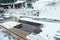 Foot bath hot spring in Ginzan Onsen with snow fall in winter season is most famous Japanese Hot Spring in Yamagata, Japan