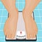 Foot on bathroom scale.