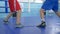 Foot of boxers on ring during sparring at sports center, close-up