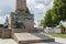 The foot of the Golden Lady monument in the center of Luxembourg