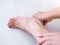 Foot injury of elderly Asian women, Heel pain from diseases plantar fasciitis or nerve inflamed