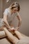 Foot massage in the massage parlor - female hands massage the female feet - beauty and health