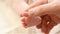 Foot massage newborn baby