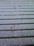 Foot prints in snow covered decking